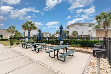 This exquisite top floor end unit is a luxurious retreat with on Barefoot Resort and Golf Club  in South Carolina - for sale on GolfHomes.com, golf home, golf lot