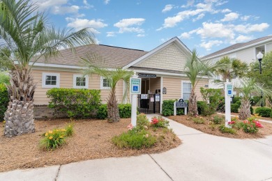 This exquisite top floor end unit is a luxurious retreat with on Barefoot Resort and Golf Club  in South Carolina - for sale on GolfHomes.com, golf home, golf lot