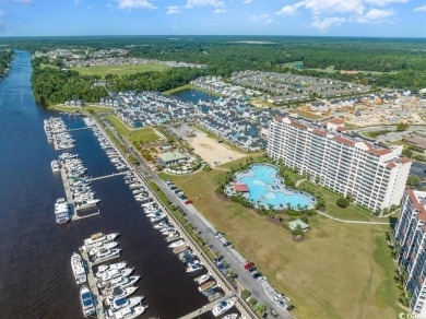 This exquisite top floor end unit is a luxurious retreat with on Barefoot Resort and Golf Club  in South Carolina - for sale on GolfHomes.com, golf home, golf lot