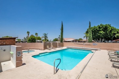 Desert Lakes 55+ Community 2-bedroom, 2-bathroom is centrally on Desert Hills Golf Course in Arizona - for sale on GolfHomes.com, golf home, golf lot