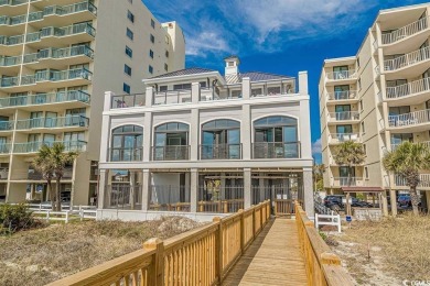 This exquisite top floor end unit is a luxurious retreat with on Barefoot Resort and Golf Club  in South Carolina - for sale on GolfHomes.com, golf home, golf lot