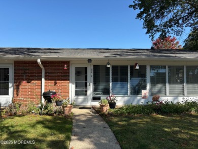 Completely updated ETON model with a highly desirable sun porch on Greenbriar Woodlands in New Jersey - for sale on GolfHomes.com, golf home, golf lot