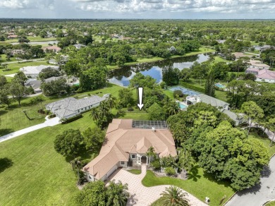 With more than 5,300 square feet under air, this Ecclestone on PGA National Estates Golf Course in Florida - for sale on GolfHomes.com, golf home, golf lot