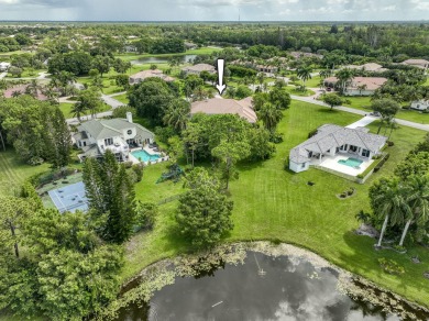 With more than 5,300 square feet under air, this Ecclestone on PGA National Estates Golf Course in Florida - for sale on GolfHomes.com, golf home, golf lot