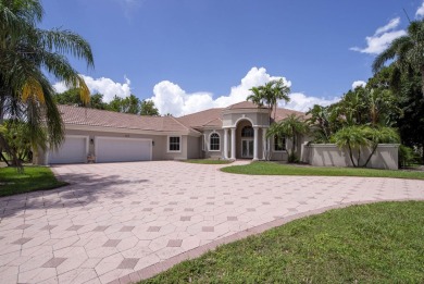 With more than 5,300 square feet under air, this Ecclestone on PGA National Estates Golf Course in Florida - for sale on GolfHomes.com, golf home, golf lot