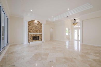 With more than 5,300 square feet under air, this Ecclestone on PGA National Estates Golf Course in Florida - for sale on GolfHomes.com, golf home, golf lot