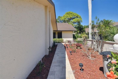 The IMG golf course is just steps away from this large 3-bedroom on IMG Academies Golf and Country Club in Florida - for sale on GolfHomes.com, golf home, golf lot