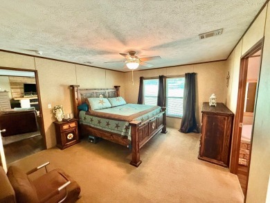 Lakeside Retreat: Spacious Home on 3.9 Acres Near Lake Sam on Rayburn Country Club in Texas - for sale on GolfHomes.com, golf home, golf lot