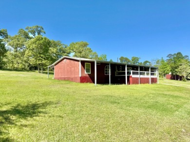Lakeside Retreat: Spacious Home on 3.9 Acres Near Lake Sam on Rayburn Country Club in Texas - for sale on GolfHomes.com, golf home, golf lot