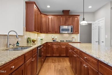 Experience refined golf course living in this luxury all-brick on TPC at Wakefield Plantation in North Carolina - for sale on GolfHomes.com, golf home, golf lot