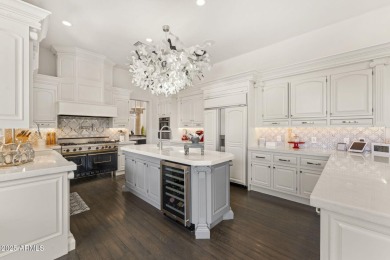 Live in one of the most desirable residences in guard gated on Gainey Ranch Golf Club in Arizona - for sale on GolfHomes.com, golf home, golf lot
