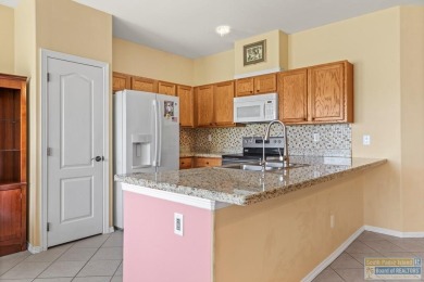 Nestled within the world-renowned South Padre Island Golf Course on South Padre Island Golf Club in Texas - for sale on GolfHomes.com, golf home, golf lot