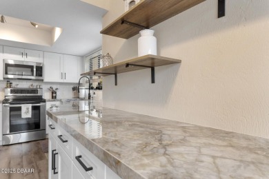 Ultra-Modern Remodeled Condo with Water Views in Pelican Bay
 on The Club At Pelican Bay - North Course in Florida - for sale on GolfHomes.com, golf home, golf lot