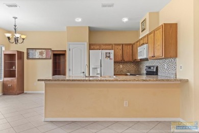 Nestled within the world-renowned South Padre Island Golf Course on South Padre Island Golf Club in Texas - for sale on GolfHomes.com, golf home, golf lot