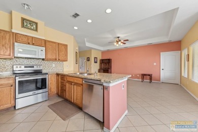 Nestled within the world-renowned South Padre Island Golf Course on South Padre Island Golf Club in Texas - for sale on GolfHomes.com, golf home, golf lot