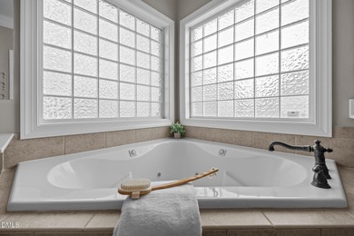 Experience refined golf course living in this luxury all-brick on TPC at Wakefield Plantation in North Carolina - for sale on GolfHomes.com, golf home, golf lot