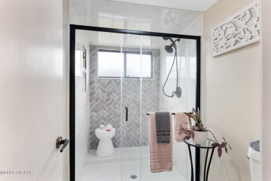 Ultra-Modern Remodeled Condo with Water Views in Pelican Bay
 on The Club At Pelican Bay - North Course in Florida - for sale on GolfHomes.com, golf home, golf lot