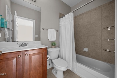 Experience refined golf course living in this luxury all-brick on TPC at Wakefield Plantation in North Carolina - for sale on GolfHomes.com, golf home, golf lot