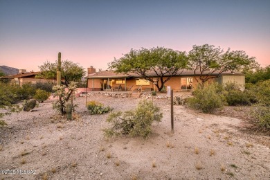 Surround yourself with the serenity of nature in this on Arizona National Golf Club in Arizona - for sale on GolfHomes.com, golf home, golf lot