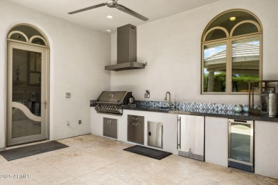 Live in one of the most desirable residences in guard gated on Gainey Ranch Golf Club in Arizona - for sale on GolfHomes.com, golf home, golf lot
