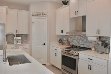 MANY UPGRADES!! Welcome to this exclusive gated community of on The Oasis Club at Champions Gate in Florida - for sale on GolfHomes.com, golf home, golf lot