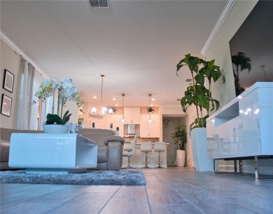 MANY UPGRADES!! Welcome to this exclusive gated community of on The Oasis Club at Champions Gate in Florida - for sale on GolfHomes.com, golf home, golf lot