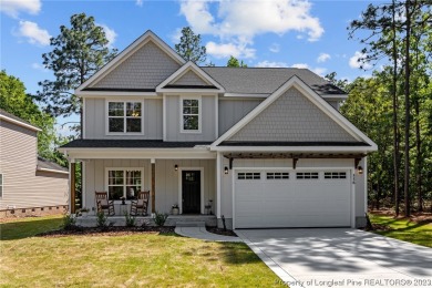 Welcome home to this new build by Wolfe Development and on Woodlake Country Club in North Carolina - for sale on GolfHomes.com, golf home, golf lot