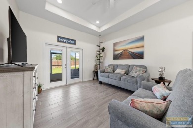 Welcome to 21 North Bay Hill in Laguna Vista! This beautifully on South Padre Island Golf Club in Texas - for sale on GolfHomes.com, golf home, golf lot