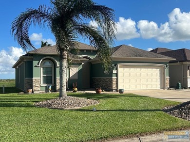 Beautiful, custom stand-alone Golf Villa with lake view. Spend on South Padre Island Golf Club in Texas - for sale on GolfHomes.com, golf home, golf lot