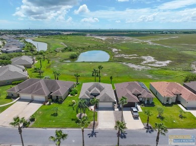 Beautiful, custom stand-alone Golf Villa with lake view. Spend on South Padre Island Golf Club in Texas - for sale on GolfHomes.com, golf home, golf lot