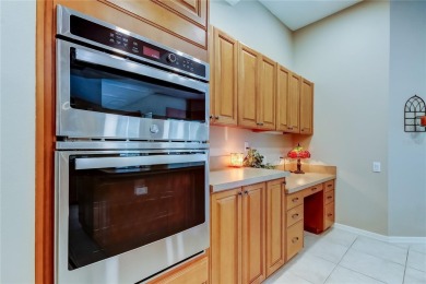 Welcome to your dream home located on a cul-de-sac with only 4 on East Lake Woodlands Country Club in Florida - for sale on GolfHomes.com, golf home, golf lot
