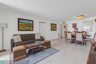 Backyard beauty! This so beautiful, light, bright condo home in on Marina Lakes Golf Course in Florida - for sale on GolfHomes.com, golf home, golf lot
