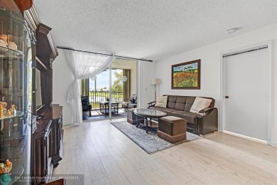 Backyard beauty! This so beautiful, light, bright condo home in on Marina Lakes Golf Course in Florida - for sale on GolfHomes.com, golf home, golf lot