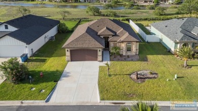 115 Torrey Pines - Beautiful 3BD/2BA open-concept home with lake on South Padre Island Golf Club in Texas - for sale on GolfHomes.com, golf home, golf lot