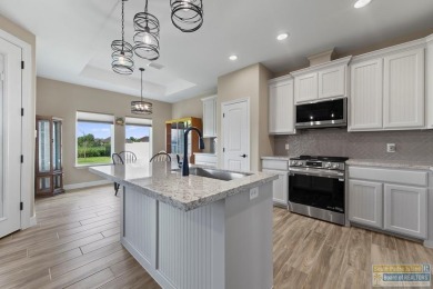 115 Torrey Pines - Beautiful 3BD/2BA open-concept home with lake on South Padre Island Golf Club in Texas - for sale on GolfHomes.com, golf home, golf lot