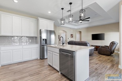 115 Torrey Pines - Beautiful 3BD/2BA open-concept home with lake on South Padre Island Golf Club in Texas - for sale on GolfHomes.com, golf home, golf lot