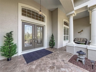 Under contract-accepting backup offers. Stunning Lakefront Home on Glenview Championship Golf and Country Club in Florida - for sale on GolfHomes.com, golf home, golf lot