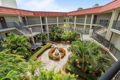Experience the charm of coastal living in this beautifully on The Dunedin Country Club in Florida - for sale on GolfHomes.com, golf home, golf lot