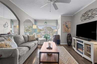 Experience the charm of coastal living in this beautifully on The Dunedin Country Club in Florida - for sale on GolfHomes.com, golf home, golf lot