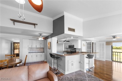 This spacious corner end unit delivers the South Florida on Hideaway Country Club in Florida - for sale on GolfHomes.com, golf home, golf lot