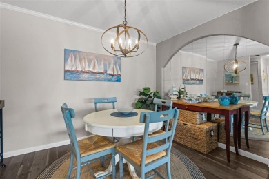 Experience the charm of coastal living in this beautifully on The Dunedin Country Club in Florida - for sale on GolfHomes.com, golf home, golf lot