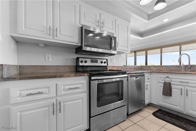 This spacious corner end unit delivers the South Florida on Hideaway Country Club in Florida - for sale on GolfHomes.com, golf home, golf lot