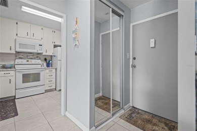 Experience the charm of coastal living in this beautifully on The Dunedin Country Club in Florida - for sale on GolfHomes.com, golf home, golf lot