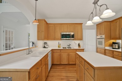 Welcome to this beautifully maintained 5-bedroom, 3-bathroom on Bridgemill Golf Club in Georgia - for sale on GolfHomes.com, golf home, golf lot