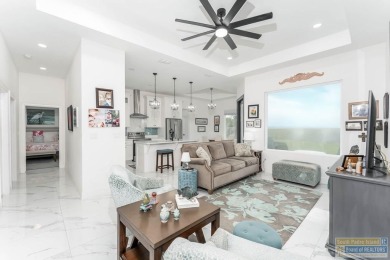 Discover your dream home in the gated SPI Golf Community! Step on South Padre Island Golf Club in Texas - for sale on GolfHomes.com, golf home, golf lot