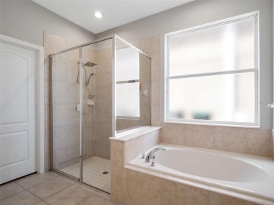 Welcome to this beautifully maintained two-story home located in on Eagle Creek Golf Club in Florida - for sale on GolfHomes.com, golf home, golf lot