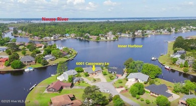 Experience unparalleled waterfront living in this waterfront on Harbour Point Golf Club in North Carolina - for sale on GolfHomes.com, golf home, golf lot