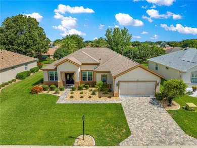 Beautifully updated and modified Granville model boasts on Eagle Ridge At Spruce Creek Country Club in Florida - for sale on GolfHomes.com, golf home, golf lot