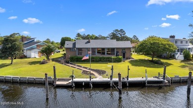 Experience unparalleled waterfront living in this waterfront on Harbour Point Golf Club in North Carolina - for sale on GolfHomes.com, golf home, golf lot