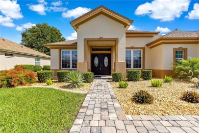 Beautifully updated and modified Granville model boasts on Eagle Ridge At Spruce Creek Country Club in Florida - for sale on GolfHomes.com, golf home, golf lot